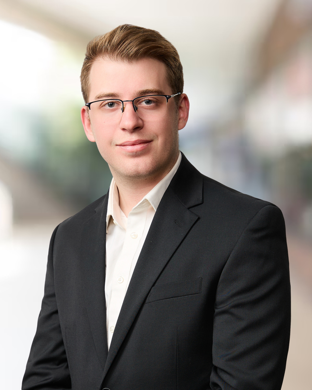 //nemesrush.com/wp-content/uploads/2026/07/Logan-Schmitt-Headshot.jpg